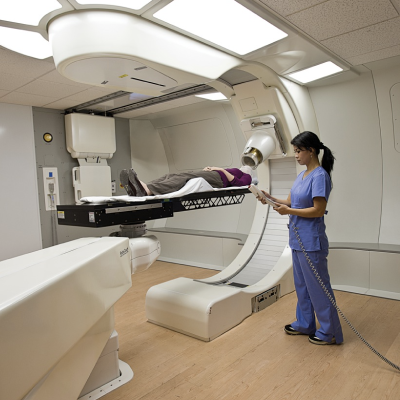 medical professional giving patient radiation scan