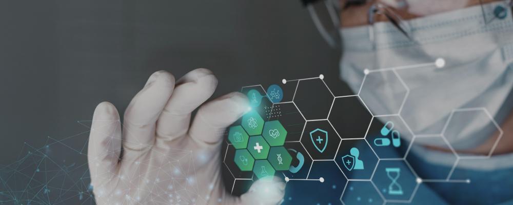 Gloved hand touching a digital screen with glowing green hexagonal medical icons.