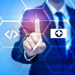 Graphic: Hand pointing at digital heartbeat, code, and medical kit icons.